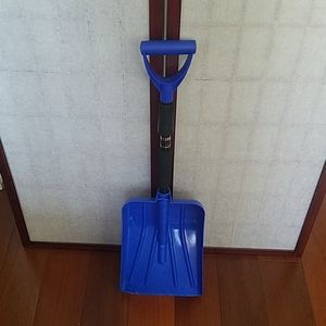 Blue and black adjustable snow shovel